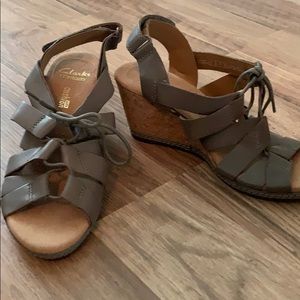 Tan-green sandals.